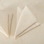 FLORA Lautasliina kermanvärinen