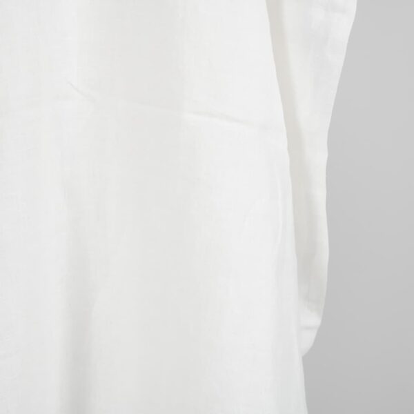 Washed linen fabric in off-white edge