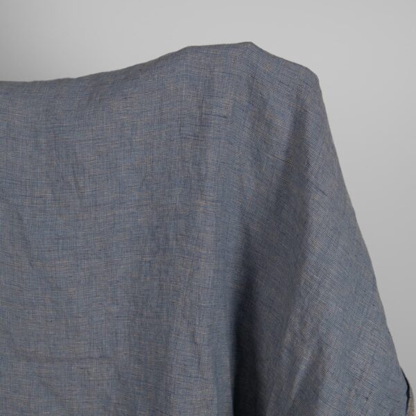 Linen Fabric Brownish Blue Color Washed for sewing clothes and home textiles close up detail view