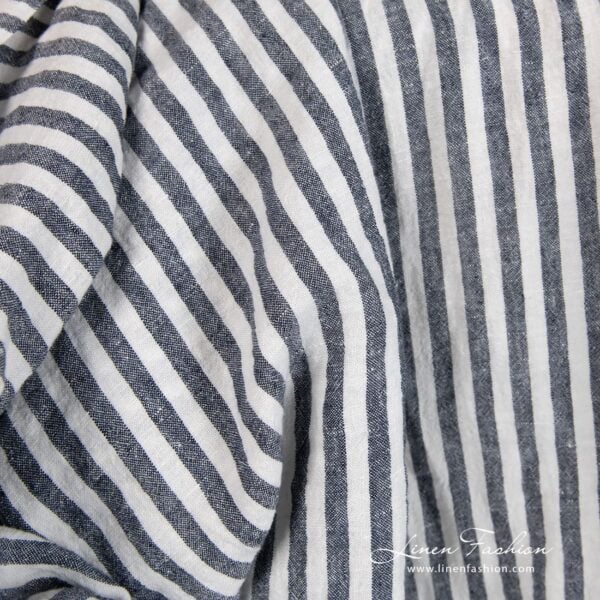 Wide linen fabric in blue stripes, specially washed to increase softness