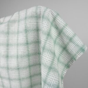 White linen cotton fabric with striped green checks product photo