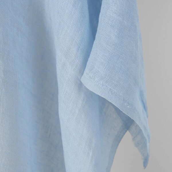 Washed linen fabric pale light blue gauze, fabric edge
