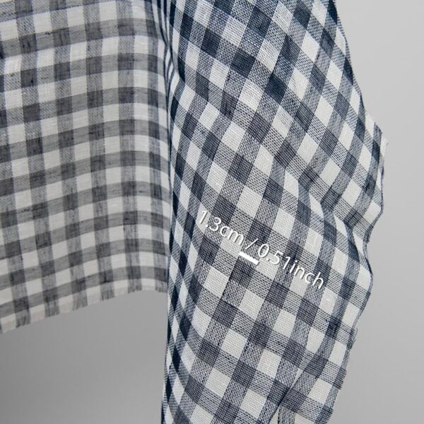 Linen fabric in dark blue and white checks, with measurements