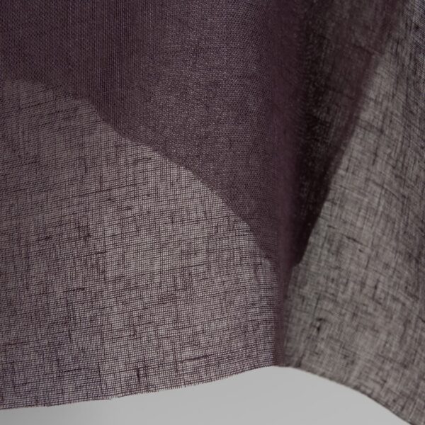 Transparent linen fabric in dark violet colour close up detail