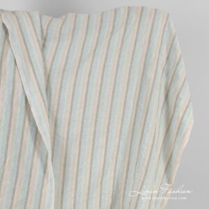 Monivärinen raidallinen pastellinsävyinen pesty pellavakangas 9 Striped linen fabric in vertical stripes