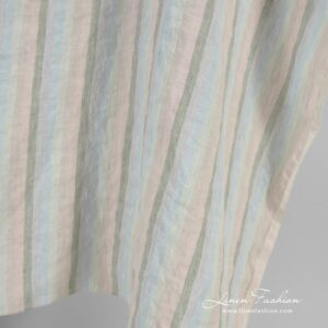 Monivärinen raidallinen pastellinsävyinen pesty pellavakangas 10 Multicolored linen fabric in vertical stripes