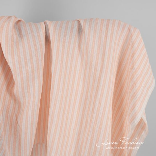 Striped linen fabric in peach color