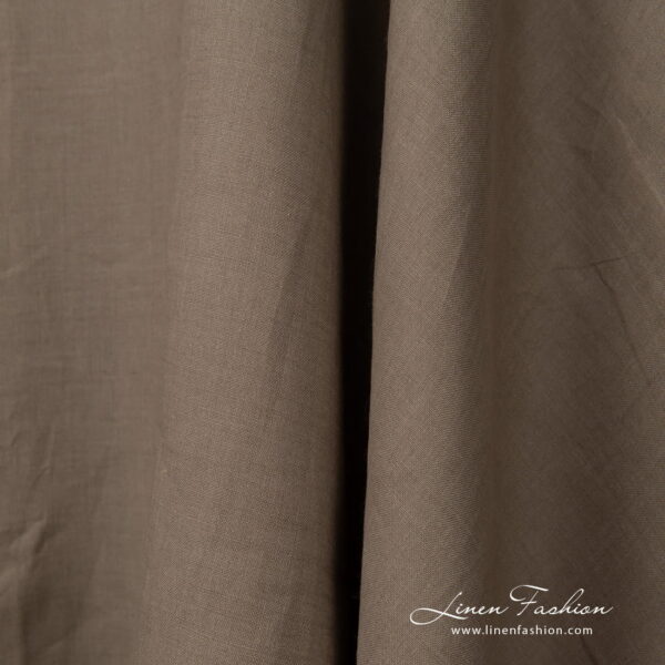 Wide linen fabric greyish brown colour close up detail