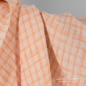 Jakardi-pellavakangas oransseilla ruuduilla, pesty 8 Jacquard linen fabric in orange checks, washed