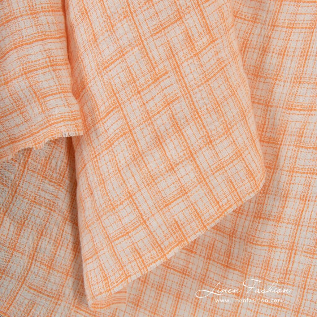 Jakardi-pellavakangas oransseilla ruuduilla, pesty 3 Jacquard linen fabric in orange checks, specially washed to increase softness
