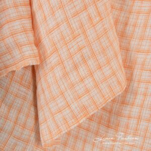 Jakardi-pellavakangas oransseilla ruuduilla, pesty 9 Jacquard linen fabric in orange checks, specially washed to increase softness