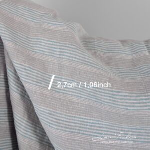 Vaalean harmaansininen pellavakangas raidoilla, pesty 12 Grey blue linen fabric in stripes, perfect for clothes and home textile