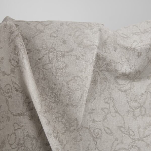 Natural colour linen cotton jacquard fabric with flowers close up detail