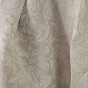Linen cotton jacquard fabric beige with flowers close up pattern