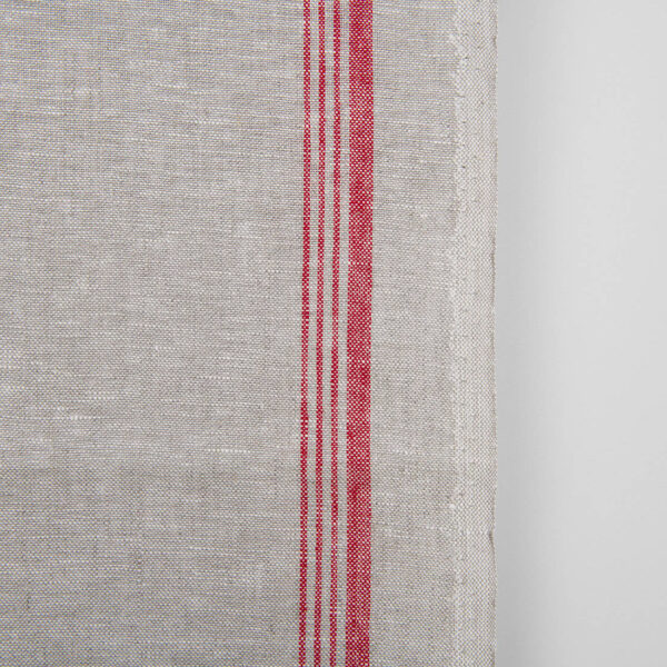 Narrow linen towel fabric in beige, with red stripes on one edge