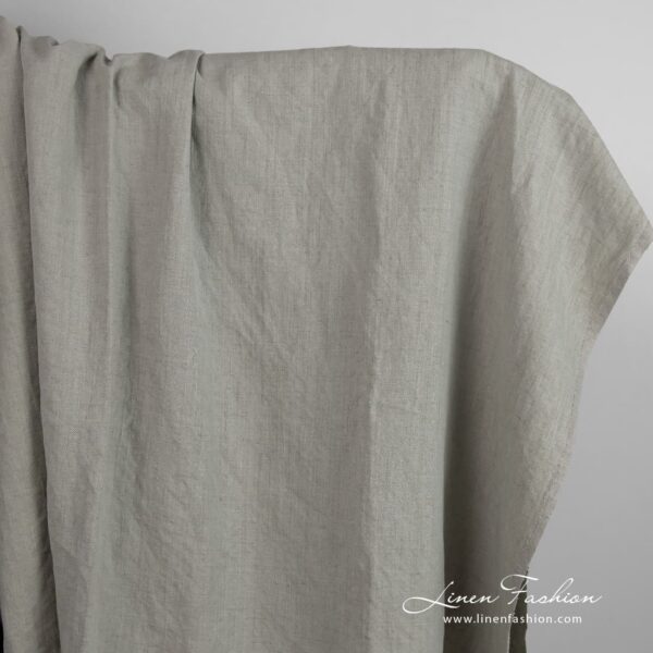 Linen cotton fabric in old green color, washed
