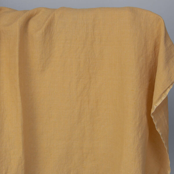 Washed linen cotton fabric in yellow-sand small pattern