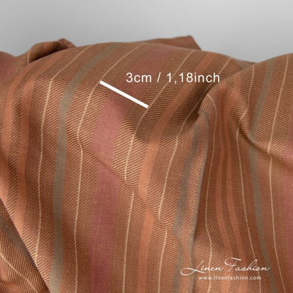 Dark brown stripes woven in diagonal lines that gives to the fabric a certain vibrancy and radiance
