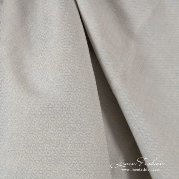 Linen cotton fabric in zigzag pattern woven from white and bluish grey yarns