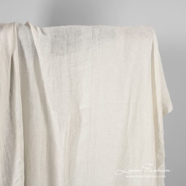 White linen fabric in rare stripes