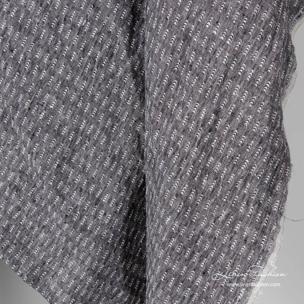 Pellava mustavalkoinen kuviollinen kangas pesty 3 Patterned linen fabric in black white mix, washed