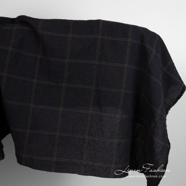 Wide black linen cotton fabric in green checks