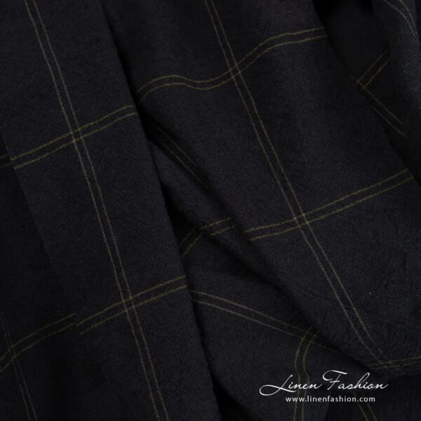 Wide black linen cotton fabric in green checks, perfect for clothes and home textile