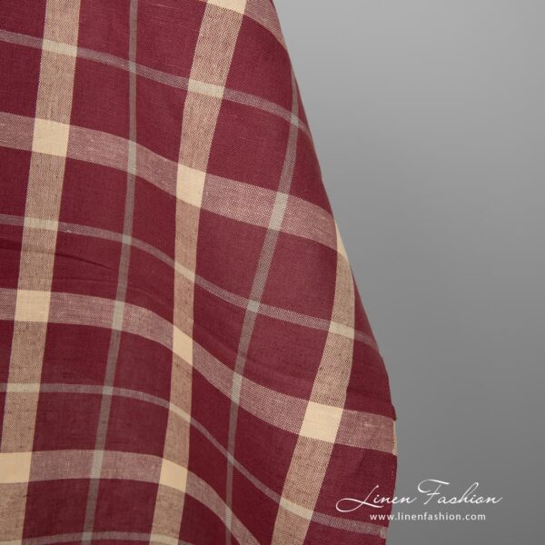 Cream checked linen cotton fabric in red.