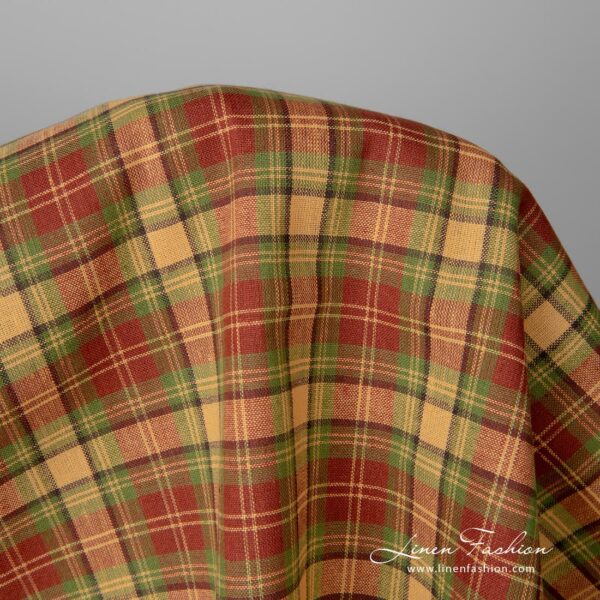 Linen cotton fabric in dark red, green and yellow checks, and with dark brown narrow stripes