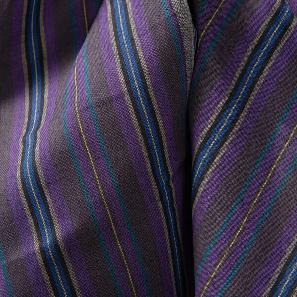Linen cotton fabric in different shade violet stripes close up detail
