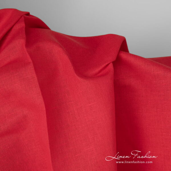 Linen cotton fabric vivid red colour close up detail