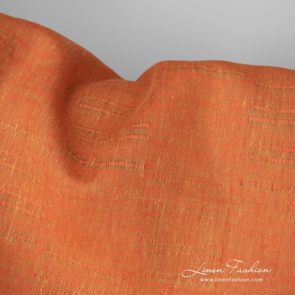 Linen fabric orange with stripes close up detail