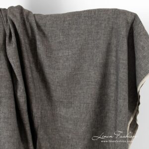 Kalanruotokuvioinen pellavakangas mustana ja luonnonvärisenä