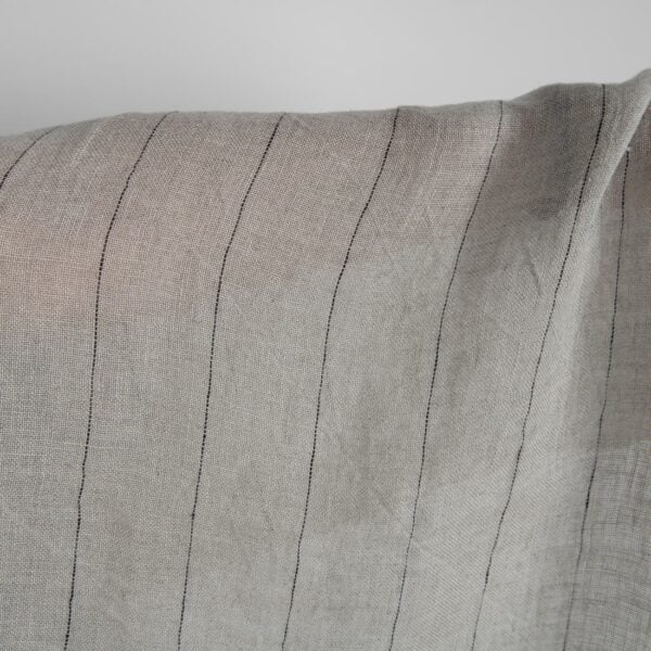 Natural transparent linen fabric with black stripes washed close up detail
