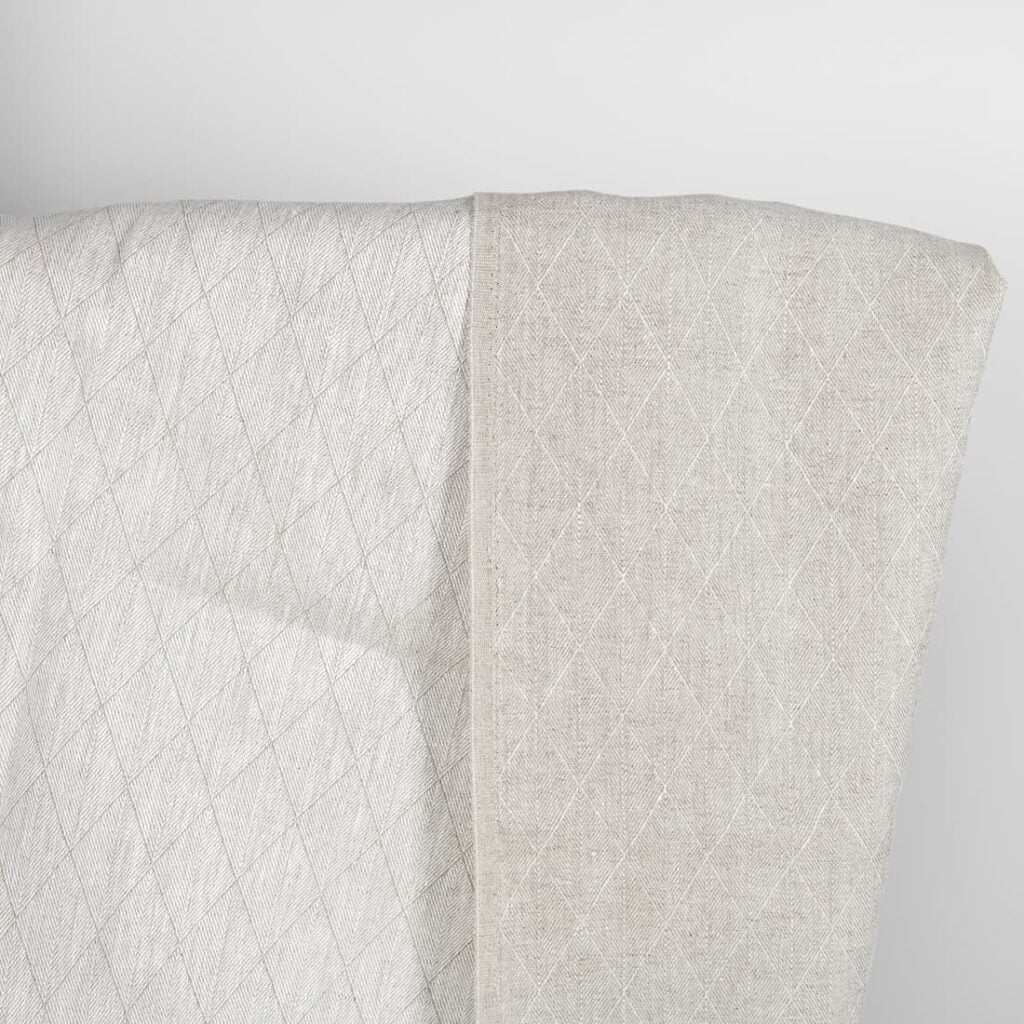 Beige double-sided linen fabric in a diamond pattern