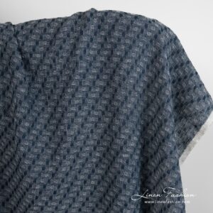 Sinimusta pellavavillakangas pesty