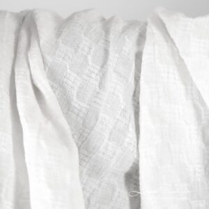 Optical white linen fabric in checks, specially washed to increase softness
