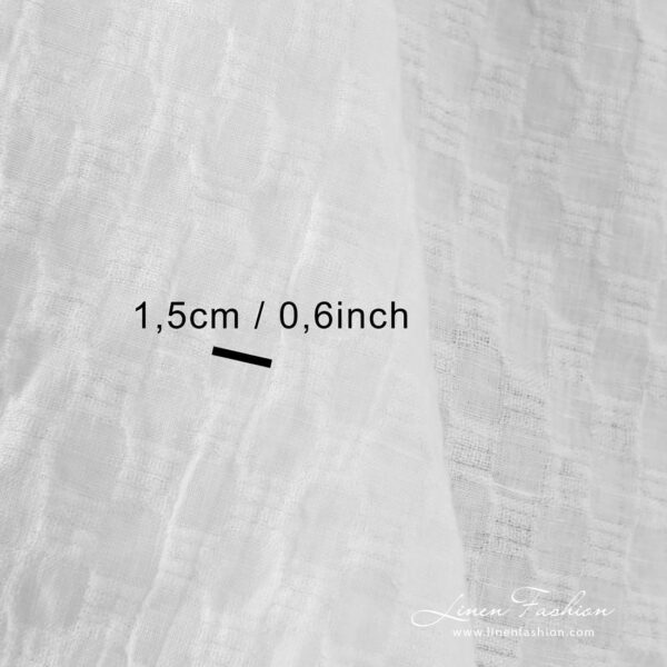 Optical white linen fabric in checks, perfect for clothes and home textile