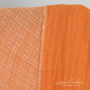 Kaksipuolinen oranssi pellavakangas ruuduilla, pesty