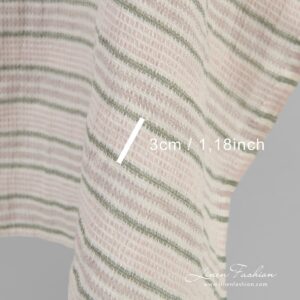 Raidallinen vaaleanpunainen pellavakangas vohvelikuviolla, pesty