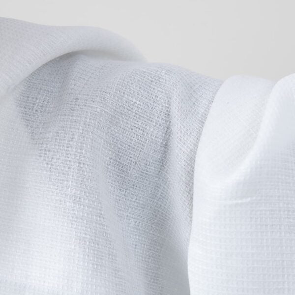 Bright white linen fabric in a small check pattern texture