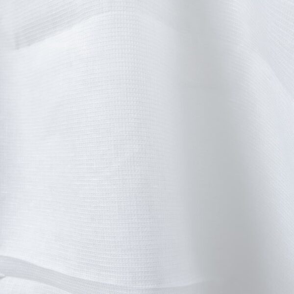 Bright white linen fabric in a small check pattern close up detail