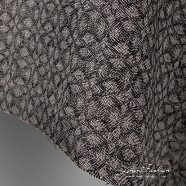 Geometrical black grey linen fabric.