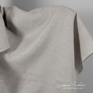 Luonnonvalkoinen ja luonnonvärinen pellavakangas kukonaskelkuviolla