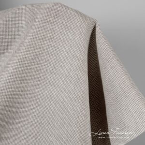 Luonnonvalkoinen ja luonnonvärinen pellavakangas kukonaskelkuviolla