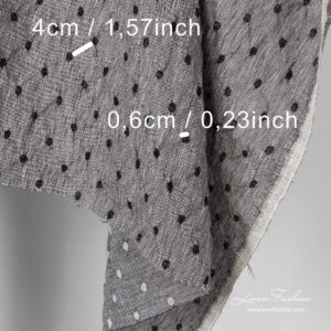 Musta/valkoinen pellava-villakangas pilkuilla pesty 9 Washed black white fabric with dots.