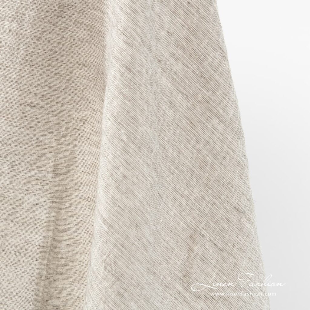 Leveä ruskeanharmaa pesty pellavapuuvillakangas 2 Brownish grey linen-cotton fabric, wide.
