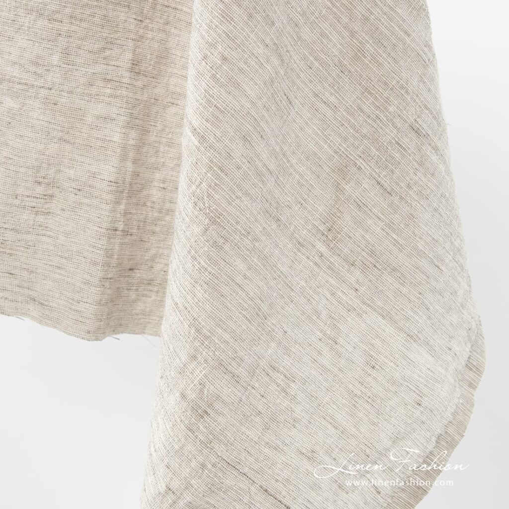Leveä ruskeanharmaa pesty pellavapuuvillakangas 4 Wide linen-cotton fabric, brownish grey.