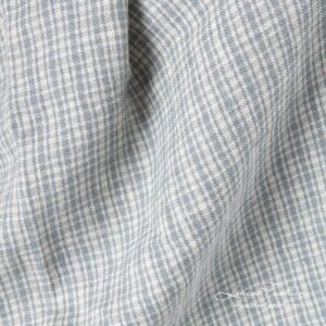 Pellavavillakangas harmailla ruuduilla, pesty