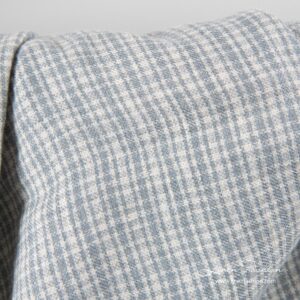 Pellavavillakangas harmailla ruuduilla, pesty